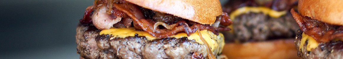 Eating Burger at Jenny's Giant Burger restaurant in Fort Bragg, CA.